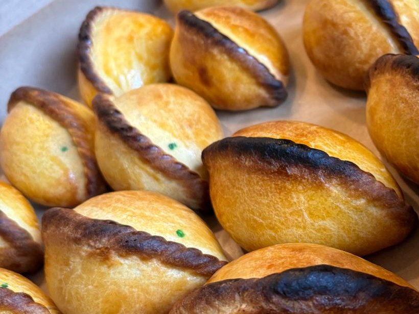 Cocktail-size salteñas fresh from the oven