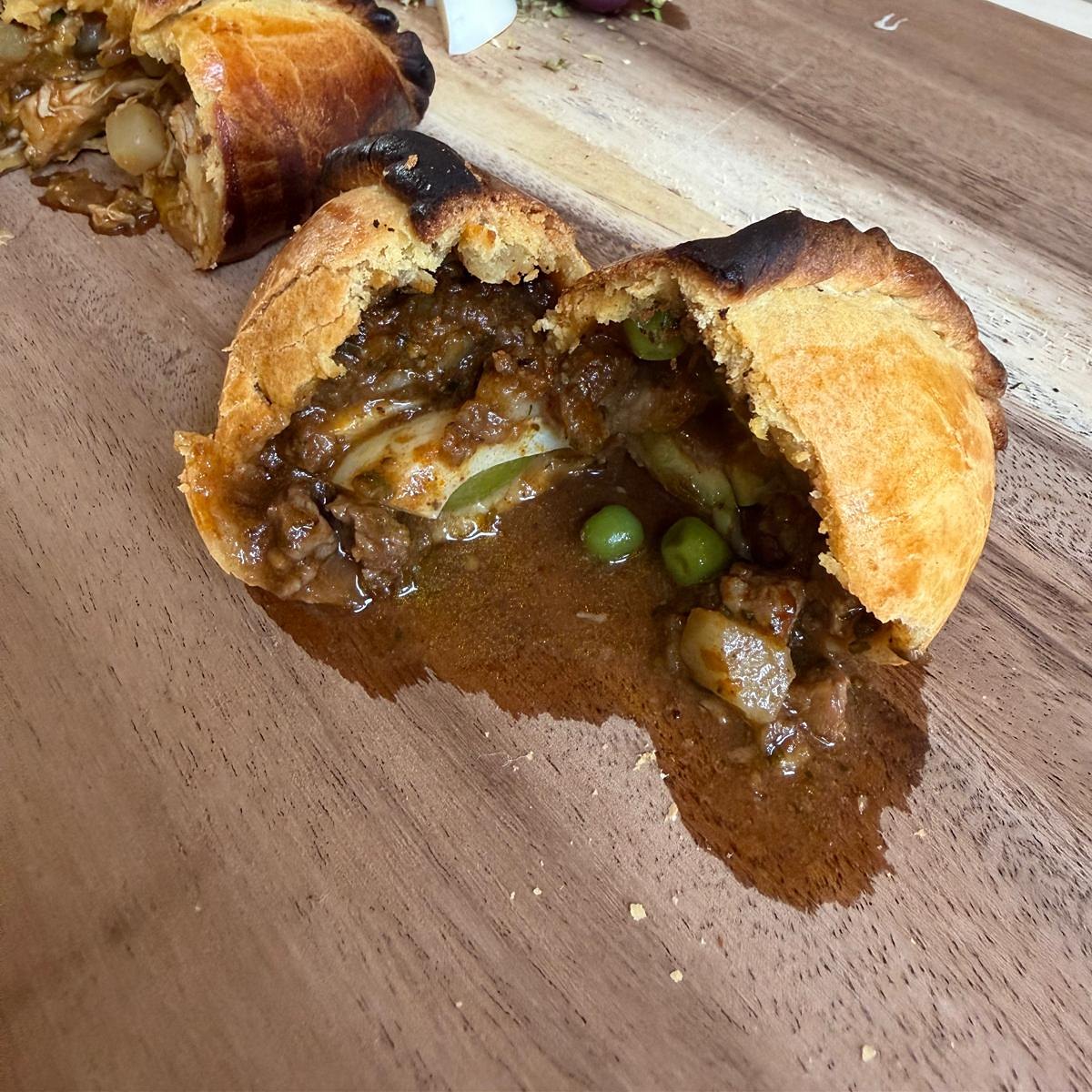A salteña cut open