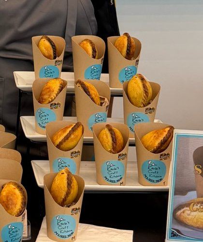 Salteñas served in Karla's Craft Kitchen cones at an event